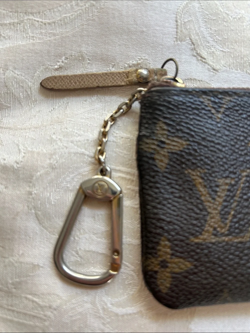 7066. Authentic Louis Vuitton Trunks & Bags Monogram Key/Coin Purse. Comes w/COA